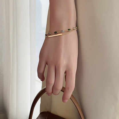 Bracelet double avec charms
