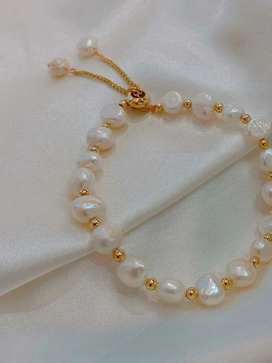 Bracelet vintage blanc avec perles et or