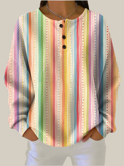 Sara - Pull à rayures colorées avec patte boutonnée